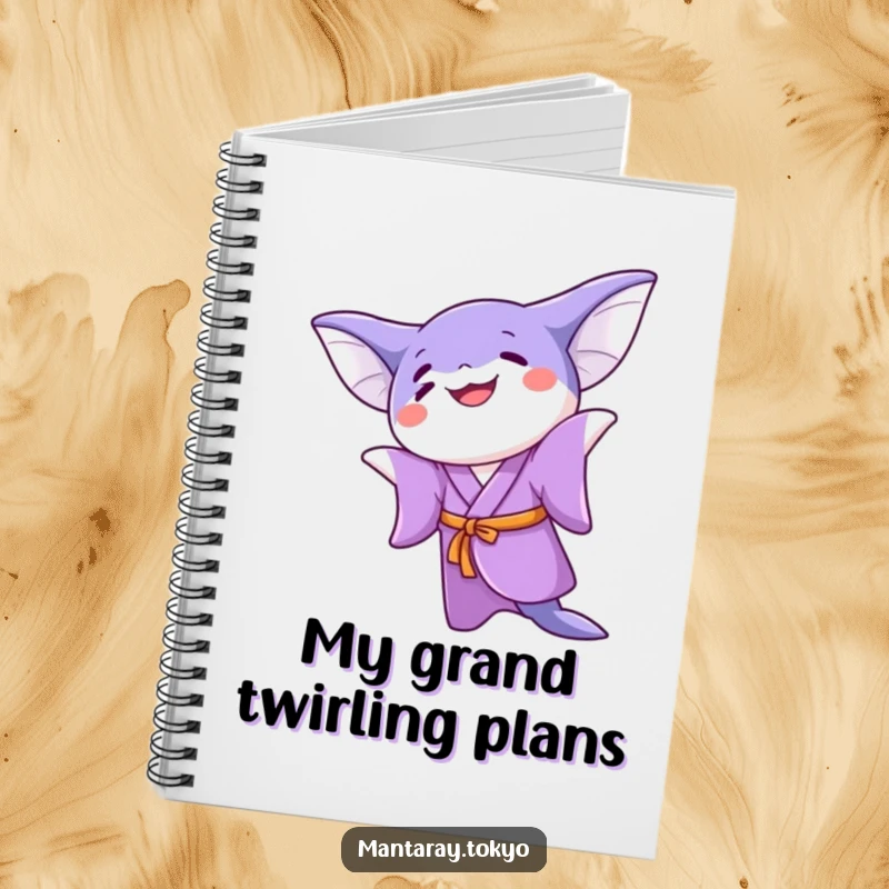 Funny kawaii manta ray in a purple kimono doing a joyful twirl, on the cover of a notebook for writing or sketching.